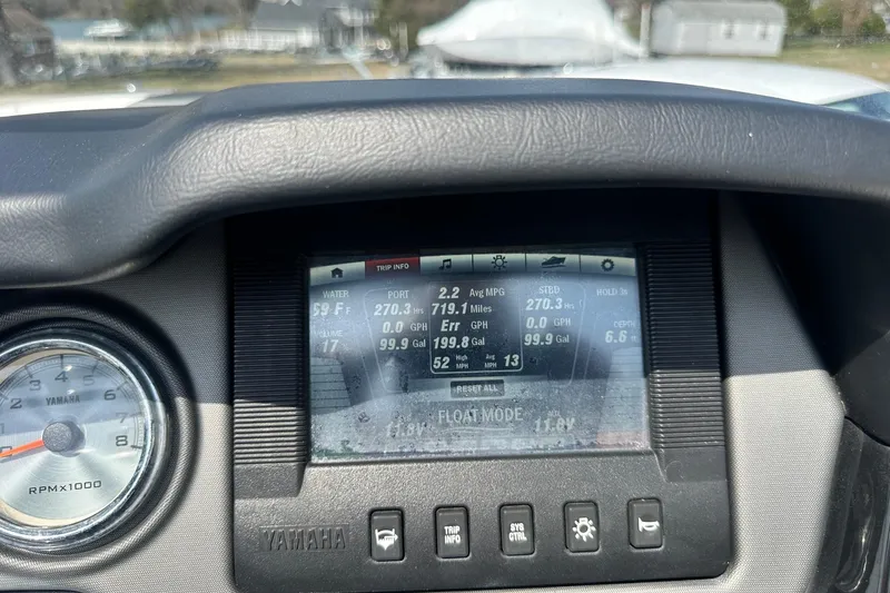 Slide: The Image of Dashboard of a 2016 Yamaha 242 Limited S boat displaying trip information. - 20