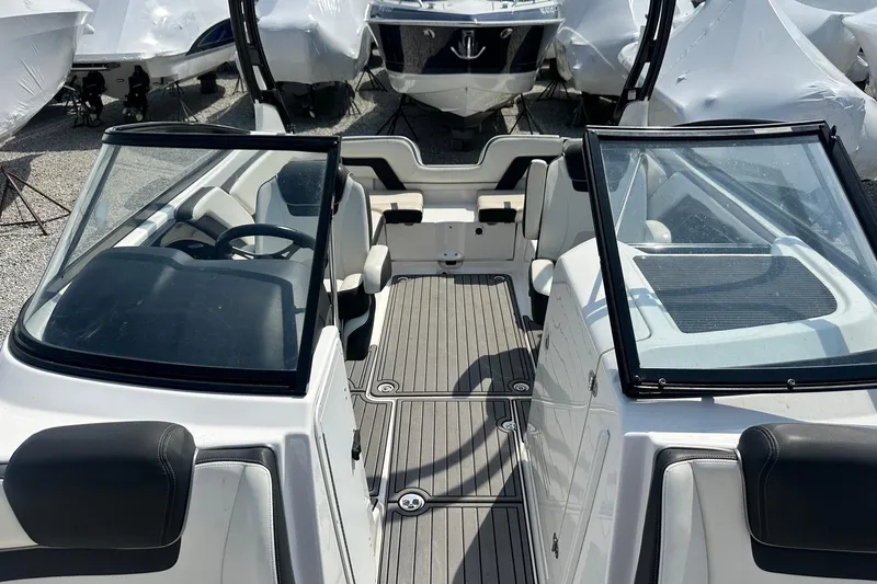 Slide: The Image of 2016 Yamaha 242 Limited S boat interior with open cockpit and seating. - 21