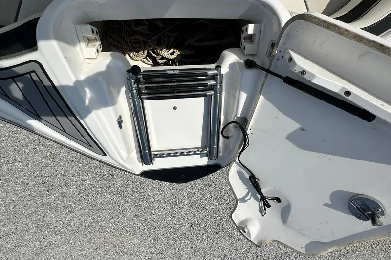 Slide: The Image of 2016 Yamaha 242 Limited S swim platform with ladder and storage compartment. - 31