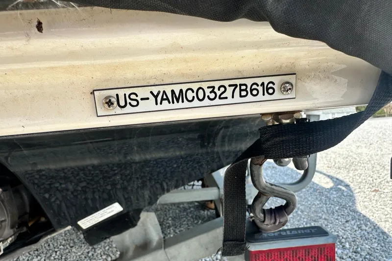 Slide: The Image of 2016 Yamaha 242 Limited S boat with visible hull identification number. - 6