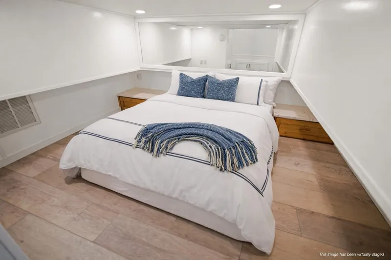 Slide: The Image of Luxurious bedroom in 2026 Sumerset Luxe III Show Boat, featuring elegant decor and cozy bedding. - 10