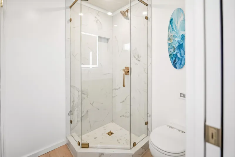 Slide: The Image of Luxurious bathroom with marble shower in 2026 Sumerset Luxe III Show Boat. - 16