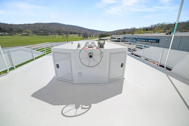 Slide: The Image of Rooftop deck of 2026 Sumerset Luxe III Show Boat with scenic countryside view. - 19