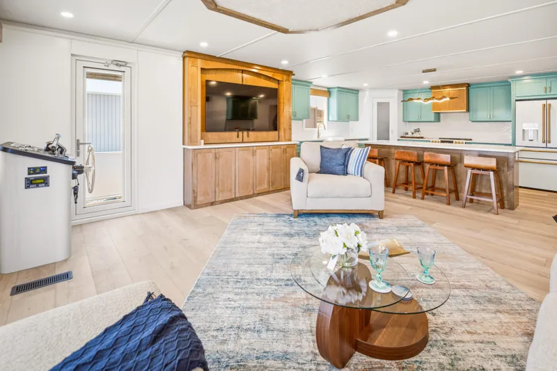 Slide: The Image of Luxurious interior of 2026 Sumerset Luxe III Show Boat with modern kitchen and cozy seating area. - 7