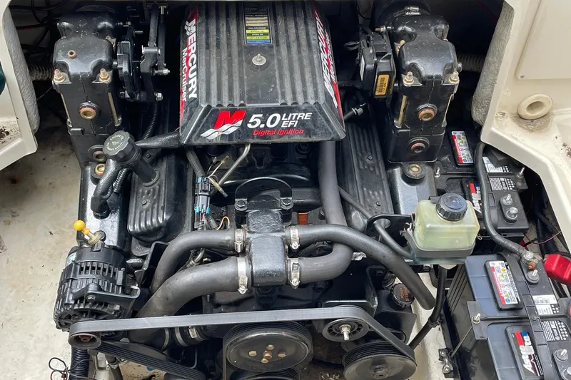 Slide: The Image of Engine compartment of a 2002 Sea Ray 225 Weekender with a 5.0L EFI MerCruiser engine. - 10