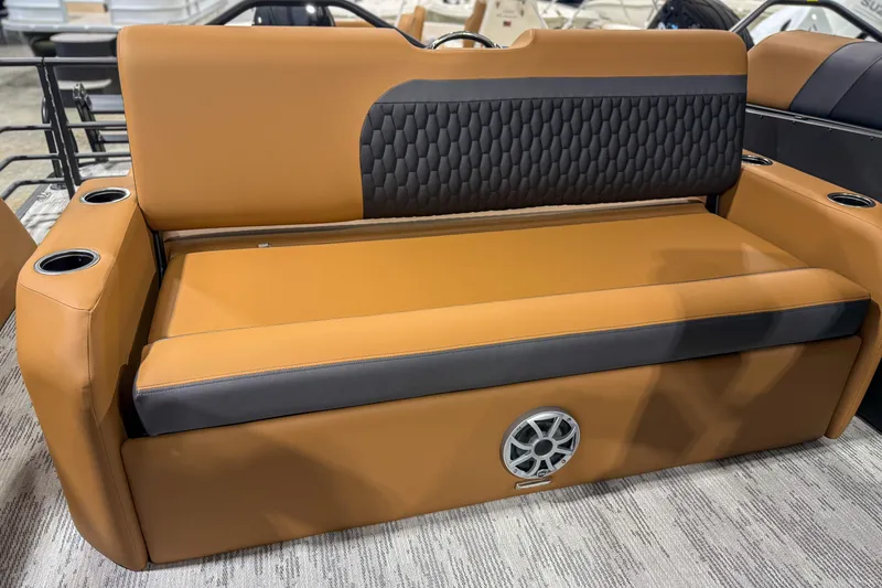 Slide: The Image of Luxurious tan and black seating on 2026 Sylvan L3 ULZ boat with cup holders. - 12