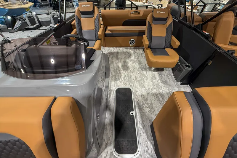 Slide: The Image of 2026 Sylvan L3 ULZ boat interior with tan and gray seating, modern design. - 6