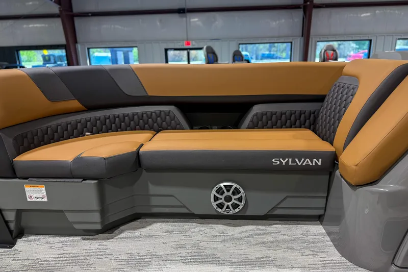 Slide: The Image of Luxurious seating in 2026 Sylvan L3 ULZ boat, featuring tan and gray upholstery. - 7
