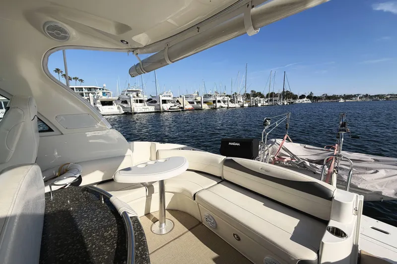 Slide: The Image of Luxurious 2007 Cruisers Yachts 390 Express Coupe interior with marina view. - 10