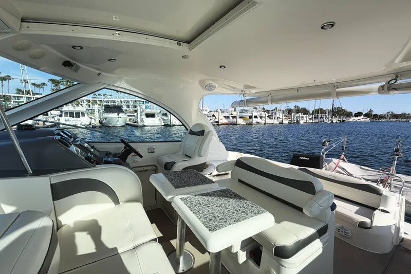 Slide: The Image of Luxurious 2007 Cruisers Yachts 390 Express Coupe interior with marina view. - 11