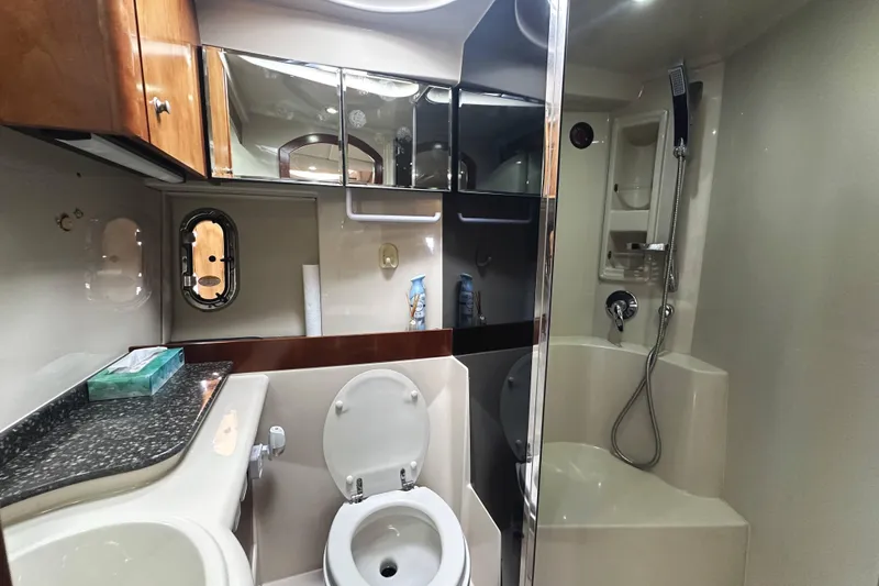 Slide: The Image of Luxurious bathroom in 2007 Cruisers Yachts 390 Express Coupe with shower and toilet. - 31