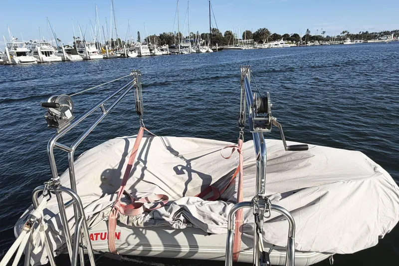 Slide: The Image of Covered boat on water with davit system, near marina; Cruisers Yachts 390 Express Coupe, 2007. - 33