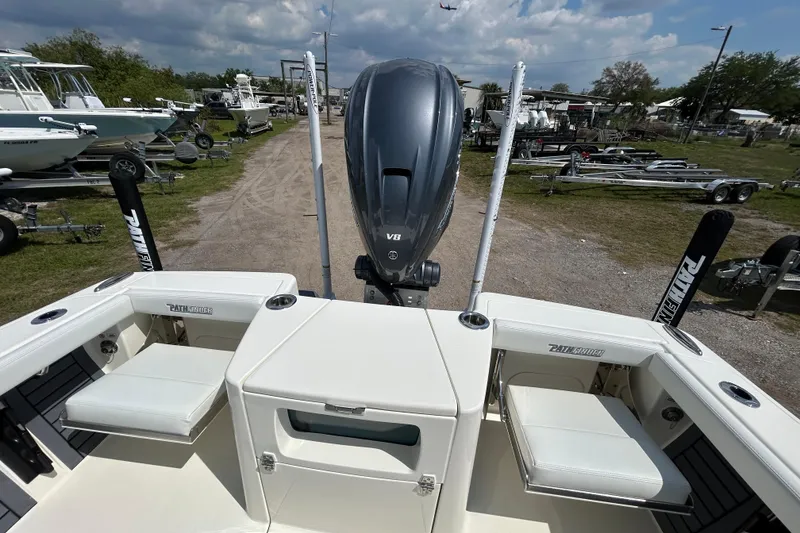 Slide: The Image of 2026 Pathfinder 2700 Open boat with V8 engine, docked outdoors. - 12