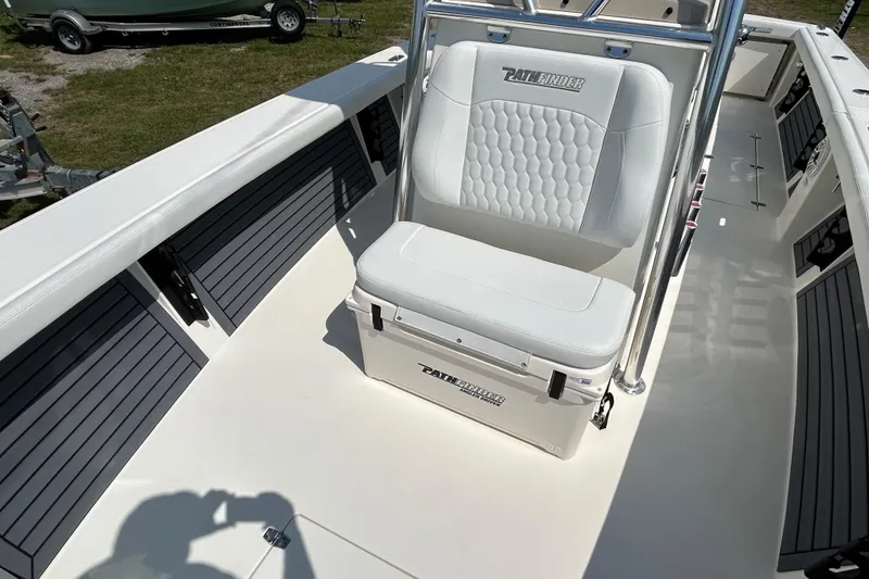 Slide: The Image of 2026 Pathfinder 2700 Open boat interior with cushioned seating and sleek design. - 6