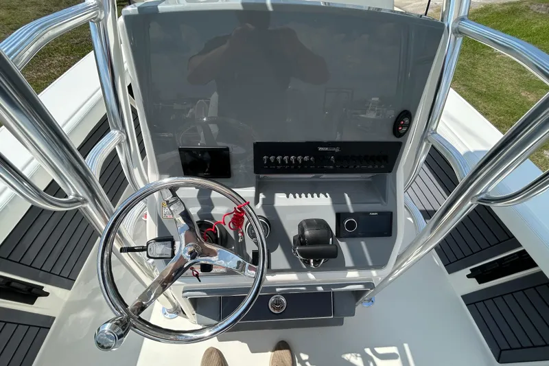 Slide: The Image of 2026 Pathfinder 2700 Open boat console with steering wheel and control panel. - 8