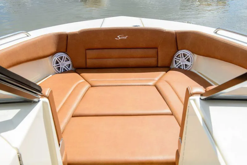 Slide: The Image of Manufacturer Provided Image: 2025 Scout 255 Dorado boat interior with tan leather seating and speakers. - 4