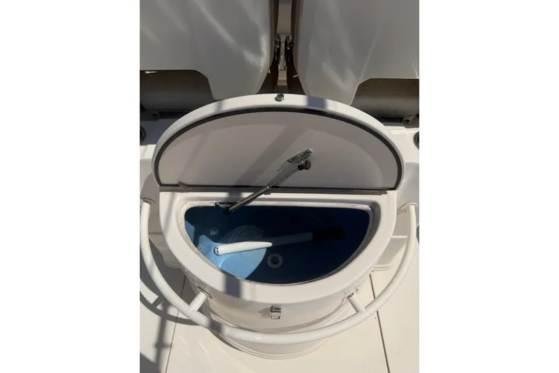 Slide: The Image of Open storage compartment on 2021 Sea Chaser 30 HFC CC boat. - 10