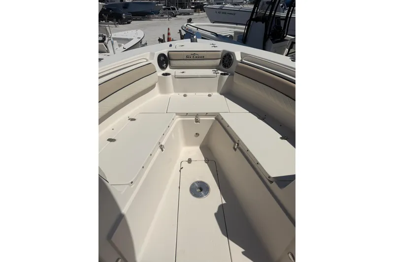 Slide: The Image of 2021 Sea Chaser 30 HFC CC boat interior with seating and storage compartments. - 14