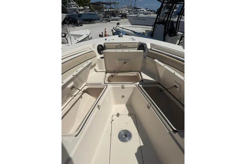 Slide: The Image of 2021 Sea Chaser 30 HFC CC boat interior with open storage compartments. - 19