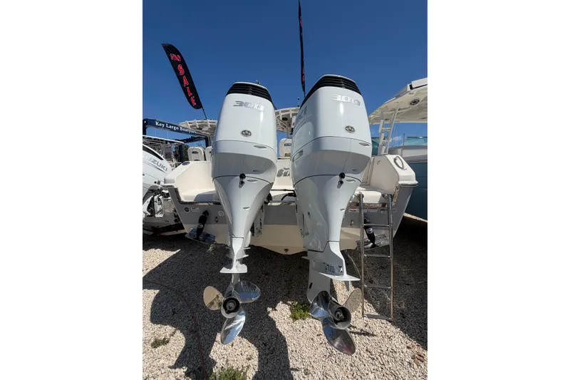 Slide: The Image of 2021 Sea Chaser 30 HFC CC boat with twin outboard engines on display. - 4