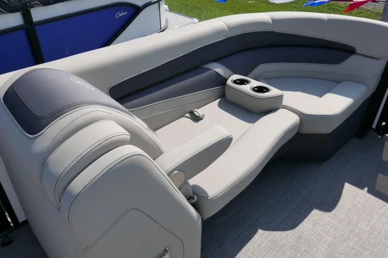 Slide: The Image of Luxurious seating on 2023 Barletta Cabrio 22UC pontoon boat with cup holders. - 5