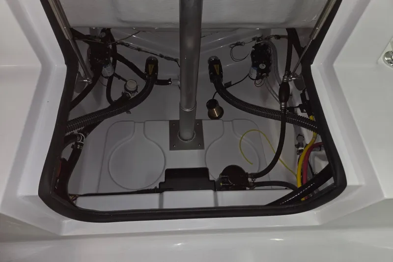 Slide: The Image of 2026 Sportsman Heritage 231 Center Console boat interior wiring and components. - 19