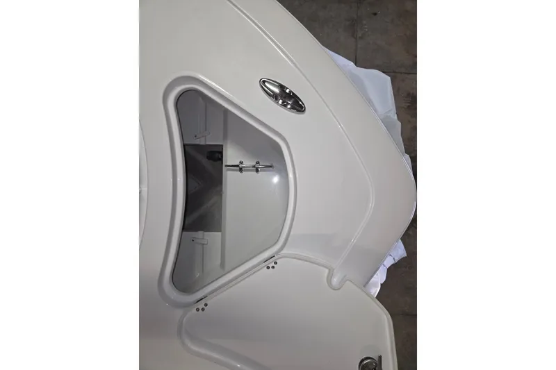 Slide: The Image of 2026 Sportsman Heritage 231 Center Console boat storage compartment detail. - 21