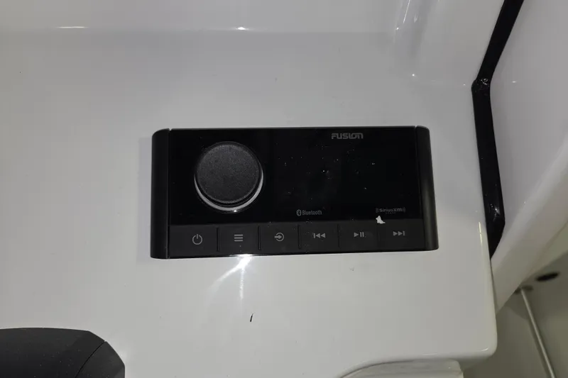 Slide: The Image of Control panel on 2026 Sportsman Heritage 231 Center Console boat dashboard. - 6