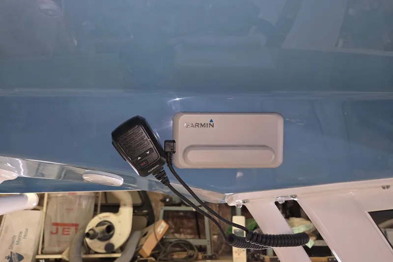 Slide: The Image of Garmin device on 2026 Sportsman Heritage 231 Center Console boat dashboard. - 8