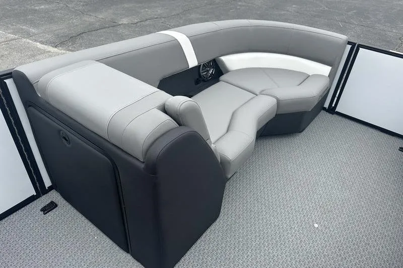 Slide: The Image of Luxurious seating on 2026 Evotti 521QL boat, featuring sleek gray and white upholstery. - 12