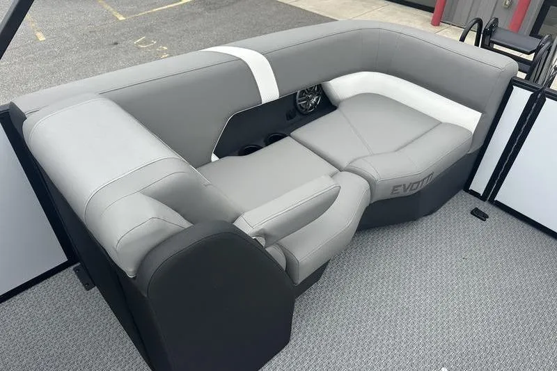 Slide: The Image of Gray and white seating area on 2026 Evotti 521QL boat, featuring modern design and speaker system. - 18