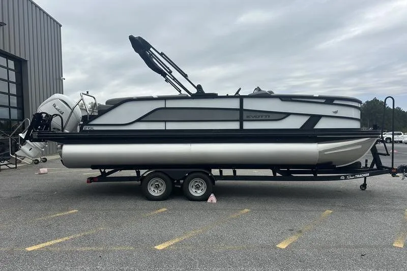 Slide: The Image of 2026 Evotti 521QL pontoon boat on trailer in parking lot. - 3