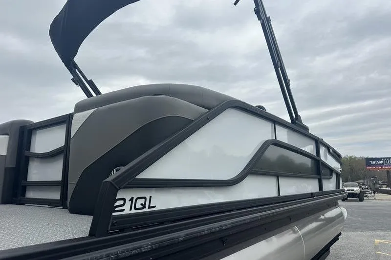 Slide: The Image of 2026 Evotti 521QL pontoon boat with sleek design and modern features. - 4