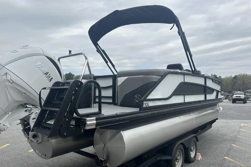 Slide: The Image of 2026 Evotti 521QL pontoon boat with Yamaha engine on trailer. - 5