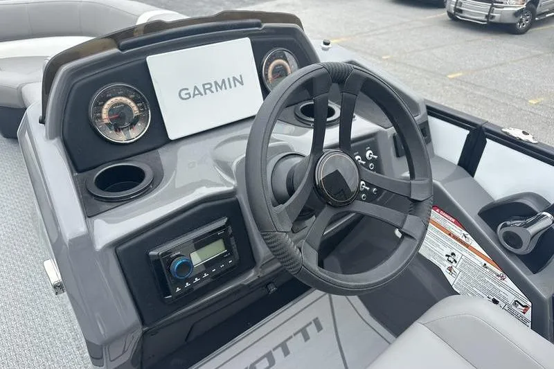 Slide: The Image of Steering console of 2026 Evotti 521QL boat with Garmin navigation system. - 8