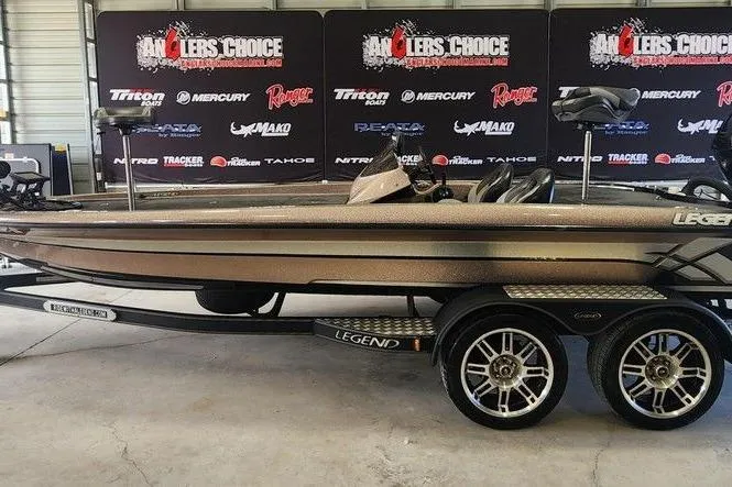 Slide: The Image of 2014 Legend 199 Alpha DC boat on trailer, displayed at Anglers Choice event. - 2