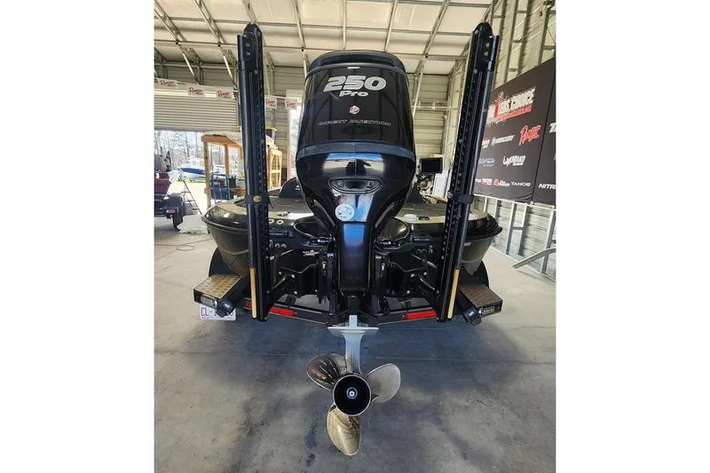 Slide: The Image of 2014 Legend 199 Alpha DC boat with 250 Pro engine in garage. - 4