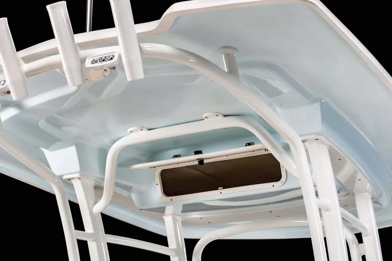 Slide: The Image of Manufacturer Provided Image: 2023 Robalo R222 Center Console T-top with rod holders and storage compartment. - 14