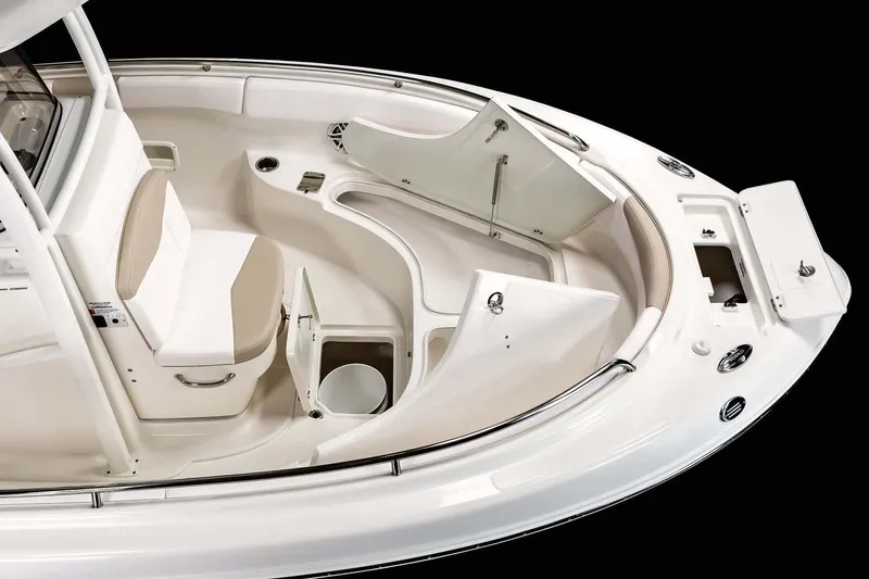 Slide: The Image of Manufacturer Provided Image: 2023 Robalo R222 Center Console boat interior with storage compartments and seating. - 15