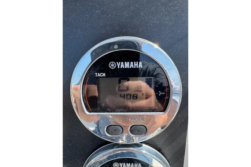 Slide: The Image of Yamaha tachometer on 2023 Robalo R222 Center Console boat dashboard. - 7