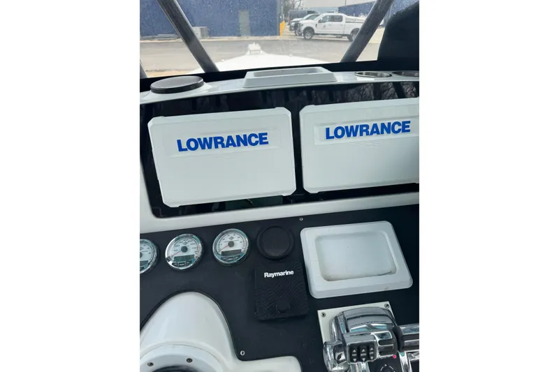 Slide: The Image of Dashboard of a 1998 Donzi 30 ZF Daytona with Lowrance equipment. - 16