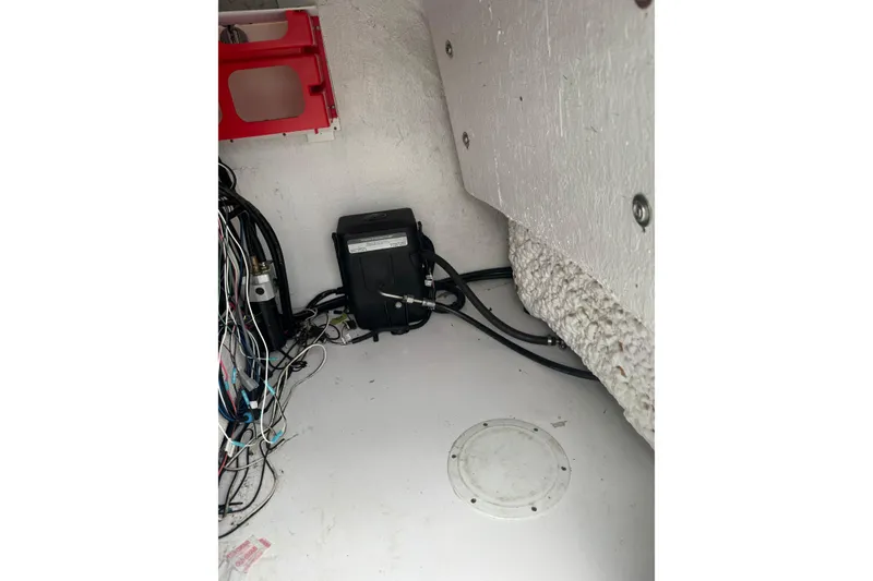 Slide: The Image of Interior wiring and components of a 1998 Donzi 30 ZF Daytona boat. - 18