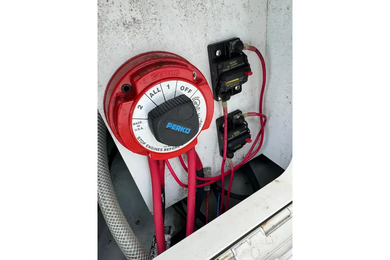 Slide: The Image of Battery switch and wiring inside a 1998 Donzi 30 ZF Daytona boat. - 19