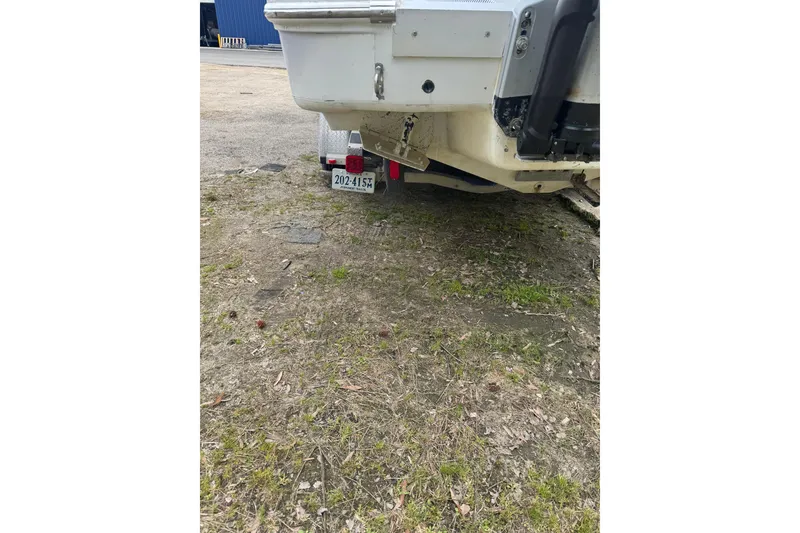 Slide: The Image of Rear view of a 1998 Donzi 30 ZF Daytona boat on a trailer. - 3