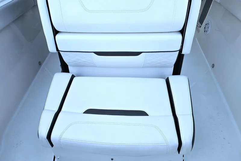 Slide: The Image of White seating on 2022 Blackfin 272 CC boat, featuring sleek design and comfortable cushioning. - 40