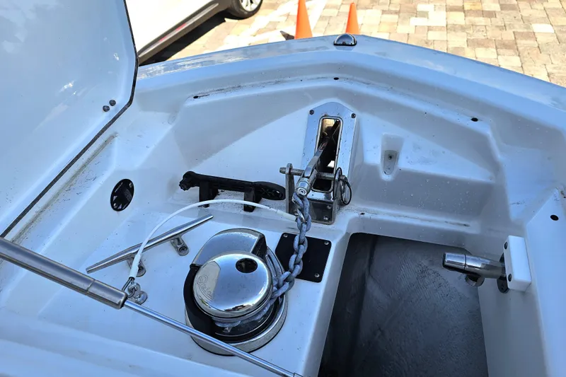 Slide: The Image of Anchor compartment of 2022 Blackfin 272 CC boat with chain and winch. - 42