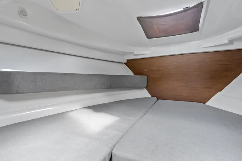 Slide: The Image of Cozy cabin interior of 2020 Jeanneau NC 795 with modern design and comfortable seating. - 22