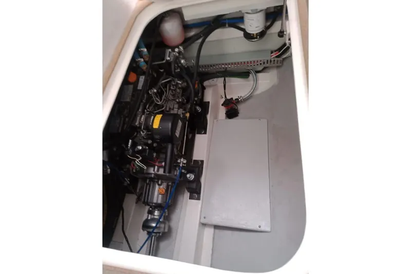 Slide: The Image of Engine compartment of 2023 Rapido 40, showcasing mechanical components and wiring. - 12