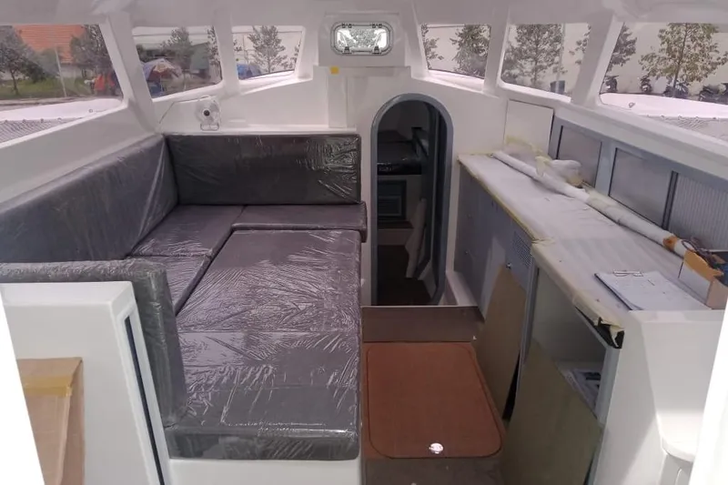 Slide: The Image of Interior of 2023 Rapido 40 boat with seating and storage areas. - 8
