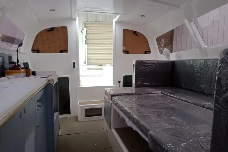 Slide: The Image of Interior of 2023 Rapido 40 yacht with modern seating and cabinetry. - 9